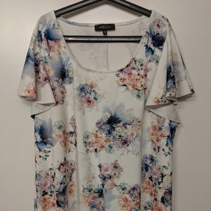 Colorful floral dress with flowy sleeves